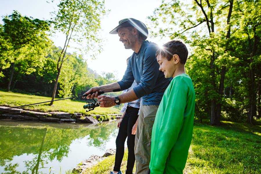 Dogwood-Canyon-Trout-Fishing-family Family fishing at Dogwood Canyon